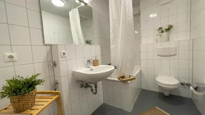 Ein Badezimmer in der Unterkunft Nordseebrandung B2 1