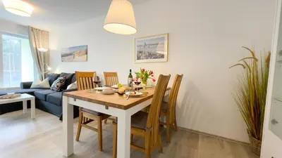 Ein Sitzbereich in der Unterkunft Nordseebrandung A5 1