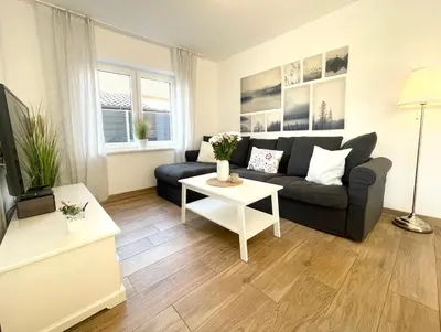Ein Sitzbereich in der Unterkunft Duhner Strand Whg 2