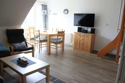 TV/Unterhaltungsangebot in der Unterkunft Ferienwohnung mit Seeblick und Schwimmbadnutzung in Cuxhaven