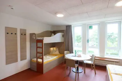 Ein Bett oder Betten in einem Zimmer der Unterkunft Jugendherberge Büsum