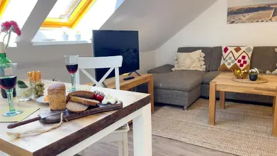 Ein Sitzbereich in der Unterkunft Haus Kirsten Haus Kirsten FeWo 6
