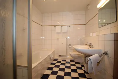 Ein Badezimmer in der Unterkunft Kurpark-Residenz 108