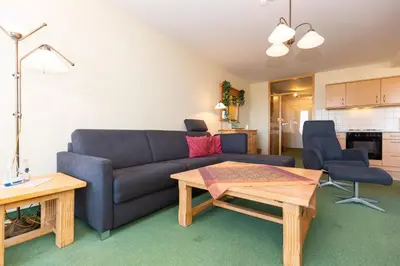 Ein Sitzbereich in der Unterkunft Kurpark-Residenz 215