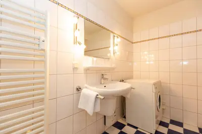 Ein Badezimmer in der Unterkunft Kurpark-Residenz 215