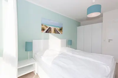 Ein Bett oder Betten in einem Zimmer der Unterkunft Marina 22-B