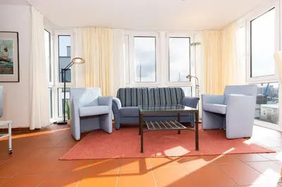 Ein Sitzbereich in der Unterkunft Marina 28-1