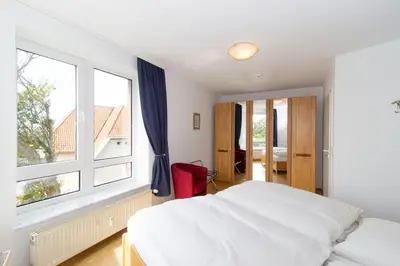 Ein Bett oder Betten in einem Zimmer der Unterkunft Seeterrassen 20