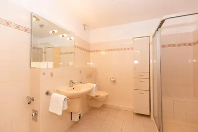 Ein Badezimmer in der Unterkunft Kurpark-Residenz 234
