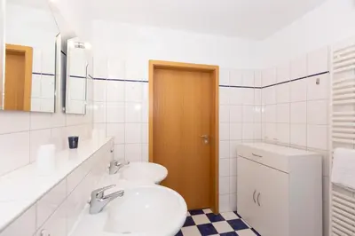 Ein Badezimmer in der Unterkunft Kurpark-Residenz 133