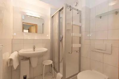 Ein Badezimmer in der Unterkunft Kurpark-Residenz 218A