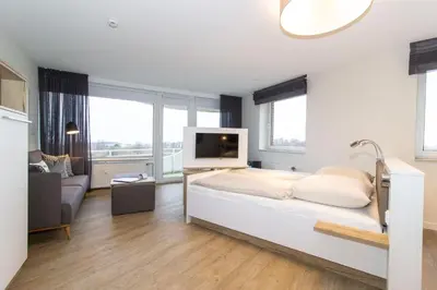 Ein Bett oder Betten in einem Zimmer der Unterkunft Lord Nelson 401