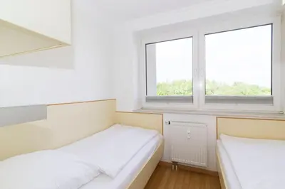 Ein Bett oder Betten in einem Zimmer der Unterkunft Lord Nelson 320