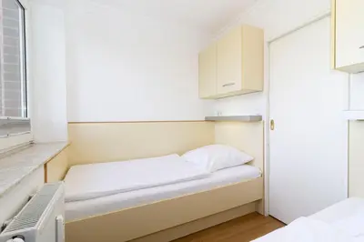 Ein Bett oder Betten in einem Zimmer der Unterkunft Lord Nelson 320