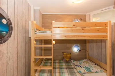 Ein Bett oder Betten in einem Zimmer der Unterkunft Kurpark-Residenz 226