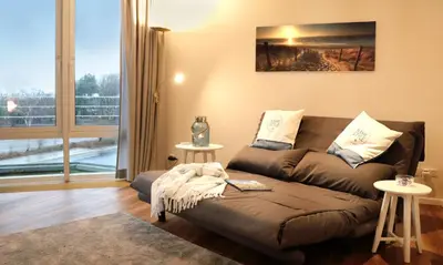 Ein Sitzbereich in der Unterkunft Kurpark-Residenz 114