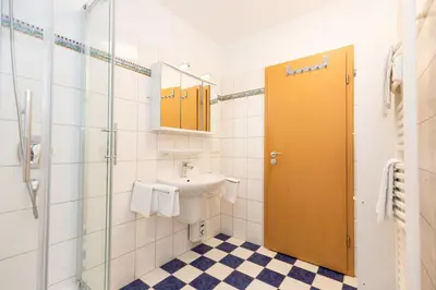 Ein Badezimmer in der Unterkunft Kurpark-Residenz 202