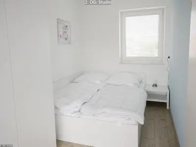 Ein Bett oder Betten in einem Zimmer der Unterkunft Marina 22C