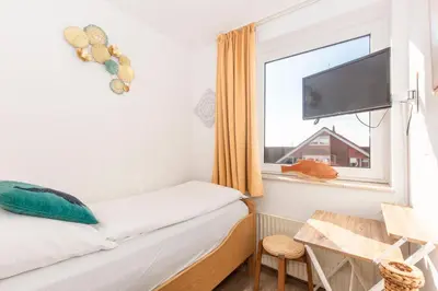 Ein Bett oder Betten in einem Zimmer der Unterkunft Lord Nelson 410