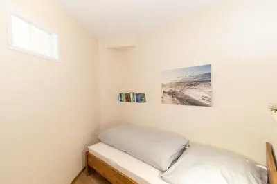 Ein Bett oder Betten in einem Zimmer der Unterkunft Seeterrassen 34