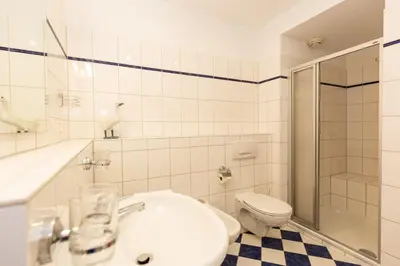 Ein Badezimmer in der Unterkunft Kurpark-Residenz 235