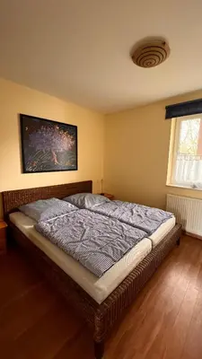 Ein Bett oder Betten in einem Zimmer der Unterkunft Ferienwohnung am Kormoranweg