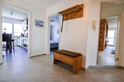 Ein Bett oder Betten in einem Zimmer der Unterkunft Haus Nordseebrandung NC61