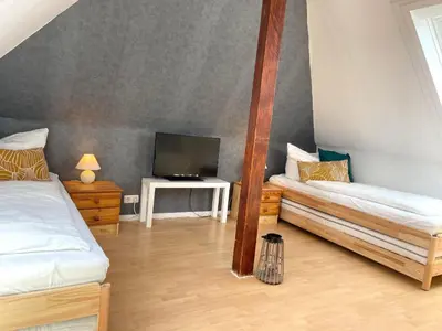 Ein Bett oder Betten in einem Zimmer der Unterkunft Nige Ooge 6