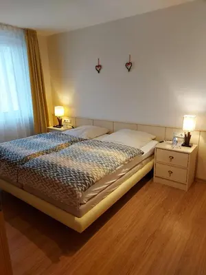Ein Bett oder Betten in einem Zimmer der Unterkunft Kurpark-Residenz 206