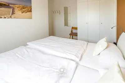 Ein Bett oder Betten in einem Zimmer der Unterkunft 