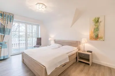 Ein Bett oder Betten in einem Zimmer der Unterkunft 