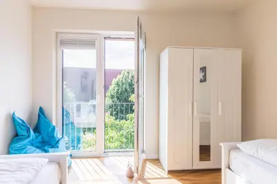 Ein Bett oder Betten in einem Zimmer der Unterkunft Kirchenstr 22 Bi de Kark