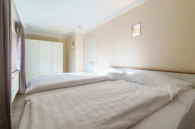 Ein Bett oder Betten in einem Zimmer der Unterkunft 