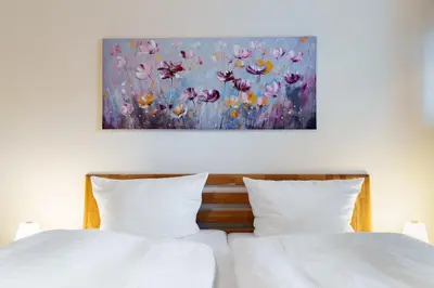 Ein Bett oder Betten in einem Zimmer der Unterkunft 