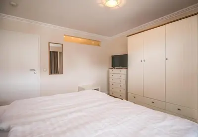 Ein Bett oder Betten in einem Zimmer der Unterkunft 