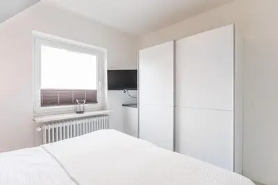 Ein Bett oder Betten in einem Zimmer der Unterkunft 