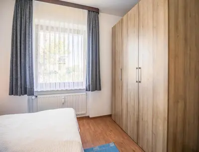 Ein Bett oder Betten in einem Zimmer der Unterkunft 