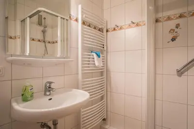 Ein Badezimmer in der Unterkunft 