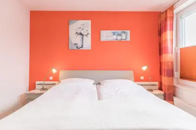 Ein Bett oder Betten in einem Zimmer der Unterkunft 