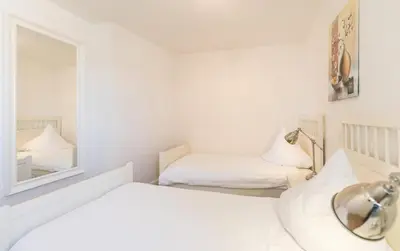 Ein Bett oder Betten in einem Zimmer der Unterkunft 