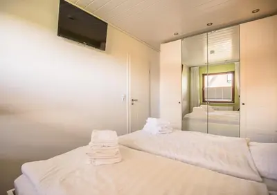 Ein Bett oder Betten in einem Zimmer der Unterkunft 