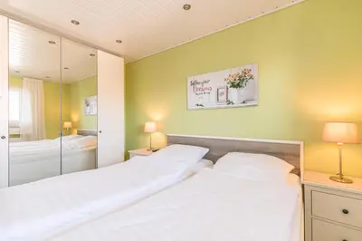 Ein Bett oder Betten in einem Zimmer der Unterkunft 