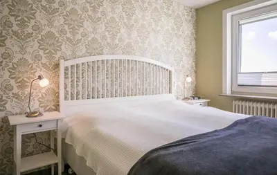 Ein Bett oder Betten in einem Zimmer der Unterkunft 