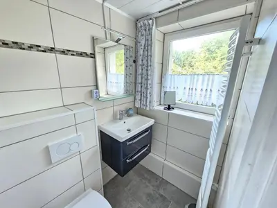 Ein Badezimmer in der Unterkunft Haus Hachtmann