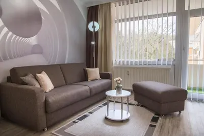 Ein Sitzbereich in der Unterkunft Apartmenthaus Frauenpreiss FeWo 104