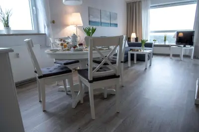 Ein Sitzbereich in der Unterkunft Frische Brise FeWo 10 01