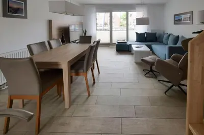 Ein Sitzbereich in der Unterkunft Marina 22