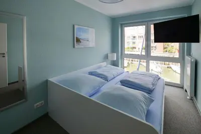 Ein Bett oder Betten in einem Zimmer der Unterkunft Marina 22
