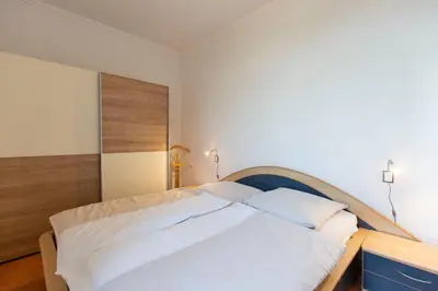 Ein Bett oder Betten in einem Zimmer der Unterkunft Kronprinz 4