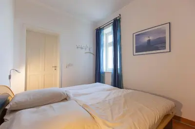 Ein Bett oder Betten in einem Zimmer der Unterkunft Kronprinz 4